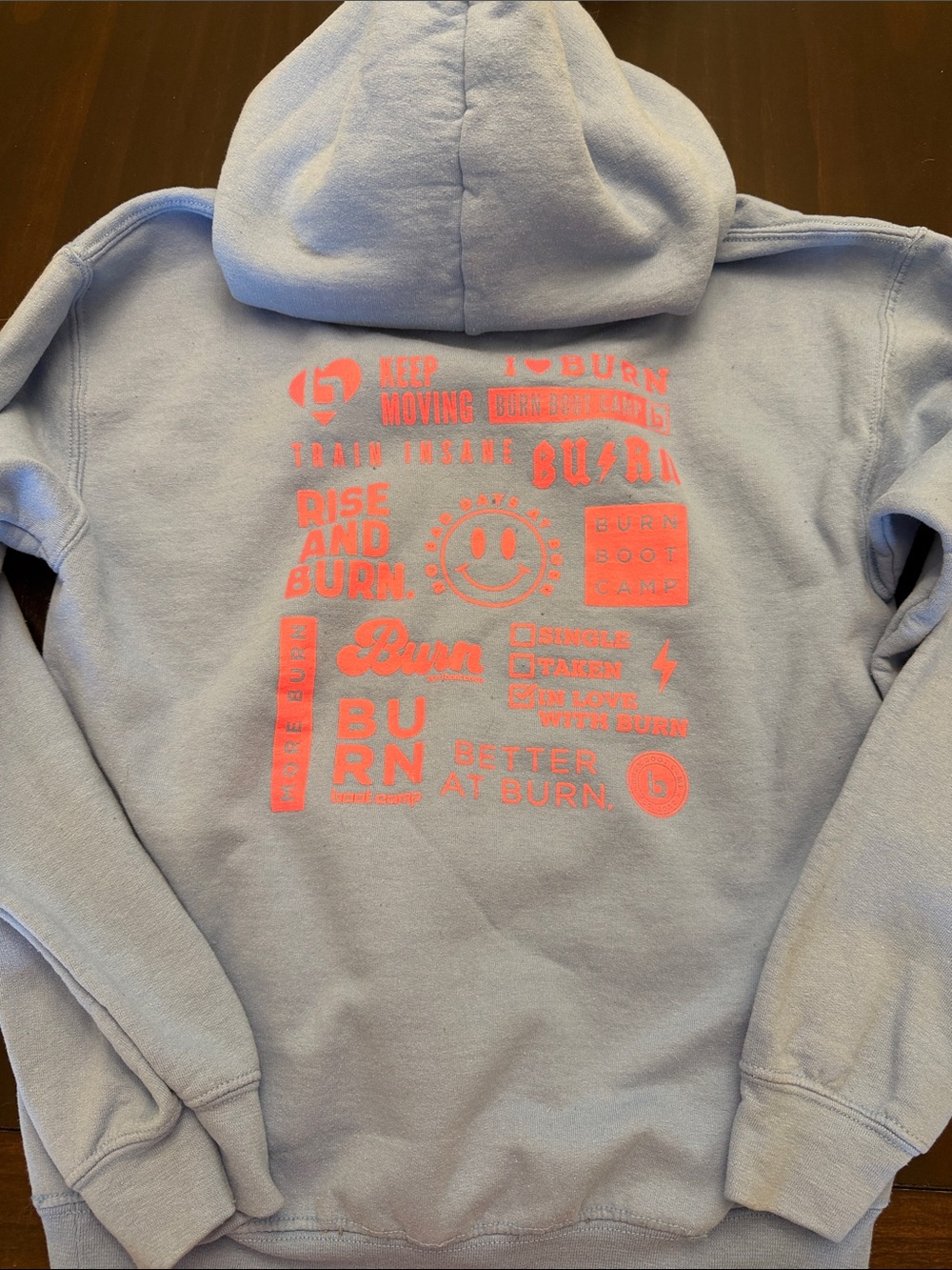 Burn Boot Camp Light Blue Hoodie with Neon Pink Graphic